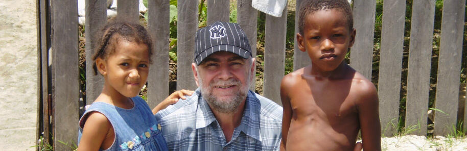 Pastor Al with two children